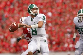 MADISON, WI - SEPTEMBER 26: Kirk Cousins #8 of the Michigan State Spartans looks to pass the ball against the Wisconsin Badgers on September 26, 2009 at Camp Randall Stadium in Madison, Wisconsin. (Photo by Jonathan Daniel/Getty Images)