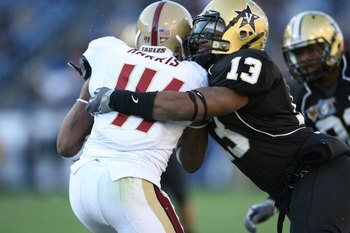 NASHVILLE, TN - DECEMBER 31:  Chris Marve #13 of the Vanderbilt Commodores tackles Montel Harris #41 of the Boston College Eagles during the Gaylord Hotels Music City Bowl at LP Field on December 31, 2008 in Nashville, Tennessee.  (Photo by Andy Lyons/Get