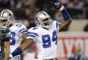 ARLINGTON, TX - JANUARY 9:  DeMarcus Ware #94 of the Dallas Cowboys reacts after the Cowboys recovered a second quarter fumble by Michael Vick #7 of the Philadelphia Eagles during the 2010 NFC wild-card playoff game at Cowboys Stadium on January 9, 2010 i