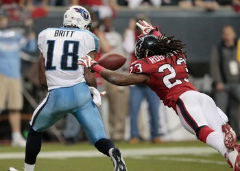 HOUSTON - NOVEMBER 23:  Wide receiver Kenny Britt #18 scores on a pass as cornerback Dunta Robinson #23 of the Houston Texans was late on the coverage in the second quarter at Reliant Stadium on November 23, 2009 in Houston, Texas.  (Photo by Bob Levey/Ge