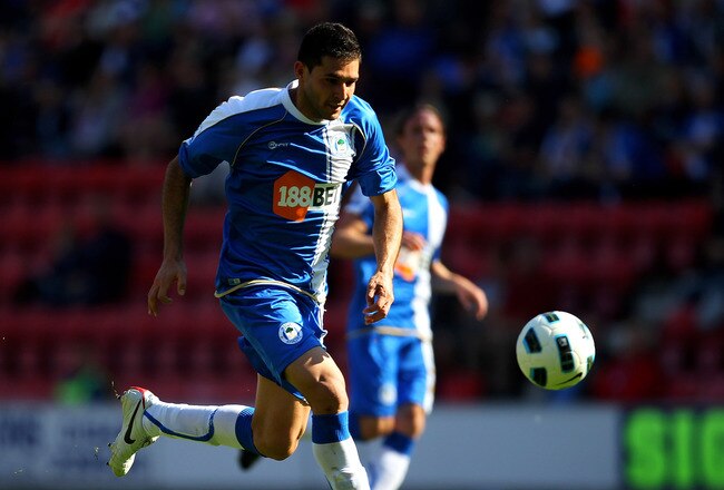 WIGAN, ENGLAND - AUGUST 14:  Antolin Alcaraz of Wigan Athletic in action during the Barclays Premier League match between Wigan Athletic and Blackpool at the DW Stadium on August 14, 2010 in Wigan, England.  (Photo by Alex Livesey/Getty Images)