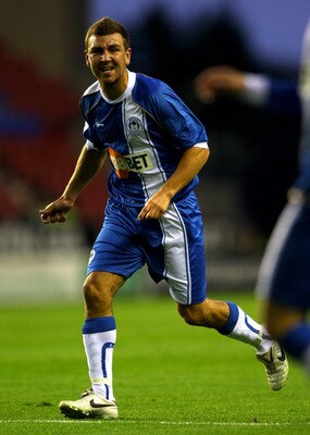 WIGAN, ENGLAND - AUGUST 04: James McArthur of Wigan Athletic in action during the pre season friendly match between Wigan Athletic and Real Zaragoza at DW Stadium on August 4, 2010 in Wigan, England.  (Photo by Clive Brunskill/Getty Images)