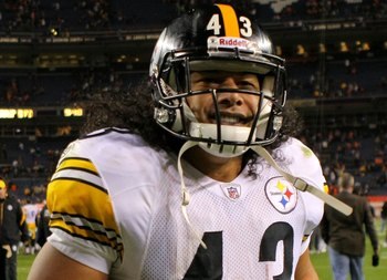 DENVER - NOVEMBER 09:  Troy Polamalu #43 of the Pittsburgh Steelers leaves the field after the game against the Denver Broncos on during NFL action at Invesco Field at Mile High on November 9, 2009 in Denver, Colorado. The Steelers defeated the Broncos 28