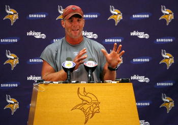 EDEN PRAIRIE, MN - AUGUST 18: Brett Favre talks with the media after his first practice with the Minnesota Vikings on August 18, 2009 at Winter Park in Eden Prairie, Minnesota.  (Photo by Scott A. Schneider/Getty Images)