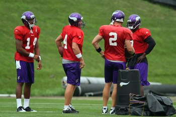 EDEN PRAIRIE, MN - AUGUST 18: Quarterbacks Joe Webb #14, Brett Favre #4, Sage Rosenfels #2 and Tarvaris Jackson #7 of the Minnesota Vikings participate Favre's first morning practice since returning to Vikings Winter Park on August 18, 2010 in Eden Prairi