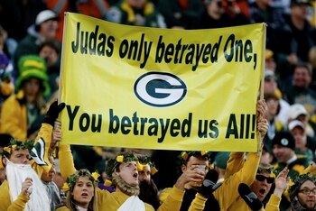 GREEN BAY, WI - NOVEMBER 01:  Fans hold a sign referring to quarterback Brett Favre #4 of the Minnesota Vikings during the game against the Green Bay Packers at Lambeau Field on November 1, 2009 in Green Bay, Wisconsin. (Photo by Scott Boehm/Getty Images)