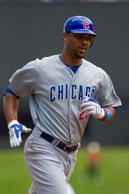 ST. LOUIS - AUGUST 15: Derek Lee #25 of the Chicago Cubs rounds the bases after hitting a home run against the St. Louis Cardinals at Busch Stadium on August 15, 2010 in St. Louis, Missouri.  The Cubs beat the Cardinals 9-7.  (Photo by Dilip Vishwanat/Get