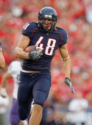 TUSCON - OCTOBER 4:  Rob Gronkowski #48 of the Arizona Wildcats carries the ball during the game against the Washington Huskies on October 4, 2008 at Arizona Stadium in Tucson, Arizona. (Photo by: Gregory Shamus/Getty Images)