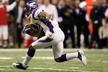 NEW ORLEANS - JANUARY 24:  Percy Harvin #12 of the Minnesota Vikings returns a punt against the New Orleans Saints during the NFC Championship Game at the Louisiana Superdome on January 24, 2010 in New Orleans, Louisiana. The Saints won 31-28 in overtime.