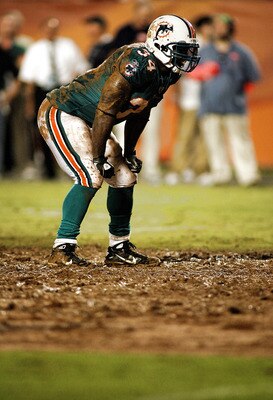 MIAMI - AUGUST 14:  Running back Ricky Williams #34 rushes against the Tampa Bay Buccaneers during the preseason game at Sun Life Stadium on August 14, 2010 in Miami, Florida.  (Photo by Marc Serota/Getty Images)
