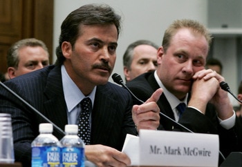 WASHINGTON - MARCH 17:  Baltimore Oriole Rafael Palmeiro testifies as Boston Red Sox pitcher Curt Schilling listens during a House Committe session investigating Major League Baseball's effort to eradicate steroid use on Capital Hill March 17, 2005 in Was