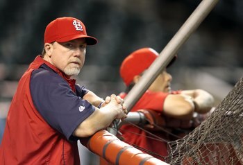 PHOENIX - JUNE 11:  Batting coach Mark McGwire #25 of the St. Louis Cardinals before the Major League Baseball game against the Arizona Diamondbacks at Chase Field on June 11, 2010 in Phoenix, Arizona. The Cardinals defeated the Diamondbacks 5-2.  (Photo