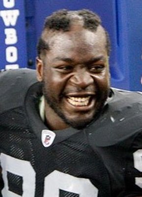Lamarr Houston on the sideline in Dallas sporting his "rookie do."