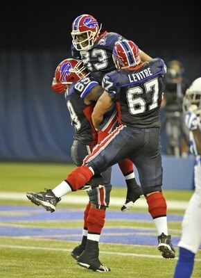Lee Evans celebrates TD catch of 69 yards from Trent Edwards