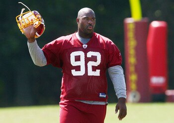 ASHBURN, VA - AUGUST 06:  Defensive lineman Albert Haynesworth #92 of the Washington Redskins walks off the field after missing his eighth consecutive day of practice during Redskins training camp on August 6, 2010 in Ashburn, Virginia.  (Photo by Win McN