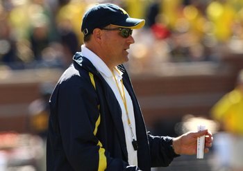 ANN ARBOR, MI - SEPTEMBER 19:  Head coach Rich Rodriguez of the Michigan Wolverines watches warmups before the game with the Eastern Michigan Eagles at Michigan Stadium on September 19, 2009 in Ann Arbor, Michigan.  Michigan won 45-17.  (Photo by Stephen