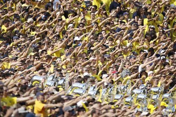 ANN ARBOR, MI - SEPTEMBER 5:  Michigan Wolverines fans cheer the game against the Western Michigan Broncos on September 5, 2009 at Michigan Stadium in Ann Arbor, Michigan. (Photo by Gregory Shamus/Getty Images)