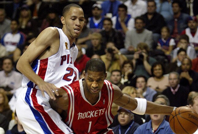 AUBURN HILLS, MI - NOVEMBER 2:  Tracy McGrady #1 of the Houston Rockets drives on Tayshaun Prince #22 of the Detroit Pistons during the first quarter on November 2, 2004 at The Palace of Auburn Hills in Auburn Hills, Michigan.  NOTE TO USER: User expressl