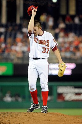 WASHINGTON - AUGUST 10:  Stephen Strasburg #37 of the Washington Nationals wipes his forehead during the game against the Florida Marlins at Nationals Park on August 10, 2010 in Washington, DC.  (Photo by Greg Fiume/Getty Images)