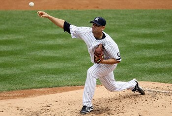 NEW YORK - AUGUST 21:  Javier Vazquez #31 of the New York Yankees delivers a pitch against the Seattle Mariners on August 21, 2010 at Yankee Stadium in the Bronx borough of New York City.  (Photo by Jim McIsaac/Getty Images)