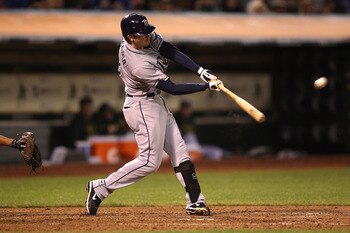 OAKLAND, CA - AUGUST 19:  Evan Longoria #3 of the Tampa Bay Rays hits a solo home run against the Oakland Athletics in the sixth inning during an MLB game at the Oakland-Alameda County Coliseum on August 19, 2010 in Oakland, California.  (Photo by Jed Jac