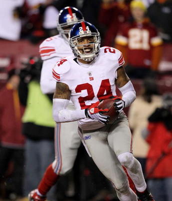 LANDOVER, MD - DECEMBER 21:  Terrell Thomas #24 of the New York Giants reacts after returning a third-quarter interception for a touchdown against the Washington Redskins at FedEx Field on December 21, 2009 in Landover, Maryland. (Photo by Al Bello/Getty