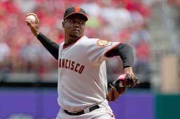 ST. LOUIS - AUGUST 22: Reliever Guillermo Mota #59 of the San Francisco Giants pitches against the St. Louis Cardinals at Busch Stadium on August 22, 2010 in St. Louis, Missouri.  (Photo by Dilip Vishwanat/Getty Images)