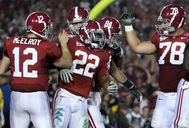 PASADENA, CA - JANUARY 07:  Running back Mark Ingram #22 of the Alabama Crimson Tide celebrates a touchdown against the Texas Longhorns with his teammates in the second quarter of the Citi BCS National Championship game at the Rose Bowl on January 7, 2010