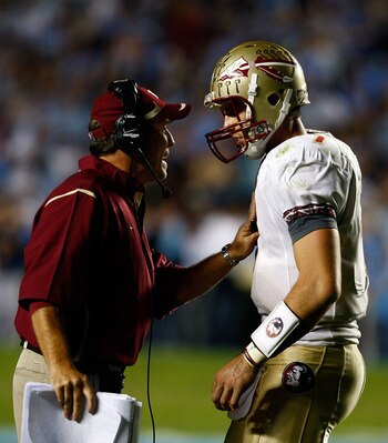 CHAPEL HILL, NC - OCTOBER 22:  Florida State Seminoles Offensive Coordinator Jimbo Fisher speaks with his quarterback Christian Ponder #7 during their game against the North Carolina Tar Heels at Kenan Stadium on October 22, 2009 in Chapel Hill, North Car