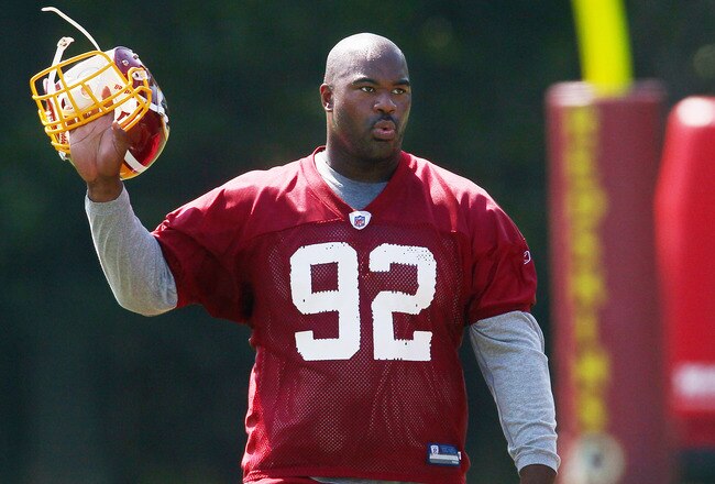 ASHBURN, VA - AUGUST 06:  Defensive lineman Albert Haynesworth #92 of the Washington Redskins walks off the field after missing his eighth consecutive day of practice during Redskins training camp on August 6, 2010 in Ashburn, Virginia.  (Photo by Win McN