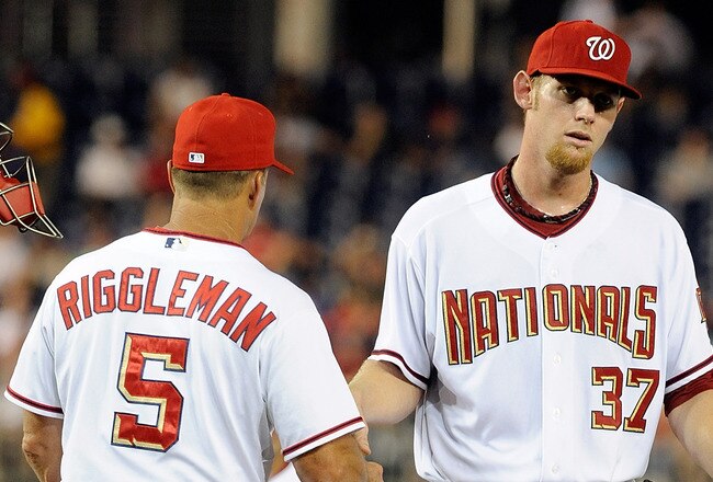 WASHINGTON - AUGUST 10:  Stephen Strasburg #37 of the Washington Nationals hands the ball to manager Jim Riggleman after being removed from the game in the fifth inning against the Florida Marlins at Nationals Park on August 10, 2010 in Washington, DC.  (