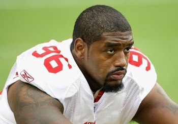 GLENDALE, AZ - SEPTEMBER 13:  Defensive end Kentwan Balmer #96 of the San Francisco 49ers warms up before the NFL game against the Arizona Cardinals at the Universtity of Phoenix Stadium on September 13, 2009 in Glendale, Arizona.  The 49ers defeated the