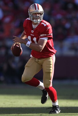 Alex Smith looks down field in the first half of Sunday's win over the Vikings.