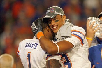 MIAMI - JANUARY 08:  Quarterback Cameron Newton #13 and Percy Harvin #1 of the Florida Gators celebrate winning the FedEx BCS National Championship Game against the Oklahoma Sooners at Dolphin Stadium on January 8, 2009 in Miami, Florida.  (Photo by Eliot