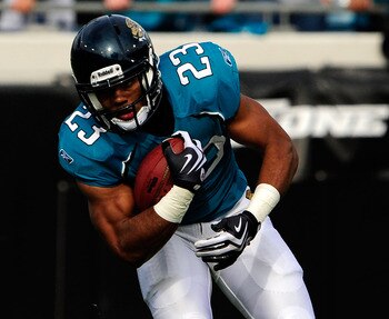 JACKSONVILLE, FL - DECEMBER 06:  Rashad Jennings #23 of the Jacksonville Jaguars runs for yardage during the game against the Houston Texans at Jacksonville Municipal Stadium on December 6, 2009 in Jacksonville, Florida.  (Photo by Sam Greenwood/Getty Ima