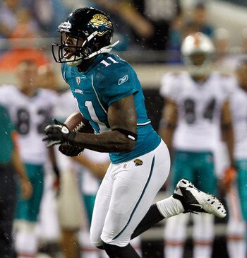 JACKSONVILLE, FL - AUGUST 21:  Mike Sims-Walker #11 of the Jacksonville Jaguars runs after making a reception during the preseason game against the Miami Dolphins at EverBank Field on August 21, 2010 in Jacksonville, Florida.  (Photo by Sam Greenwood/Gett
