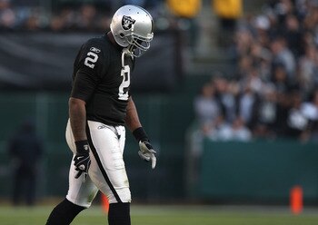 OAKLAND, CA - JANUARY 03:  JaMarcus Russell #2 of the Oakland Raiders walks off the field against the Baltimore Ravens during an NFL game at Oakland-Alameda County Coliseum on January 3, 2010 in Oakland, California.  (Photo by Jed Jacobsohn/Getty Images)
