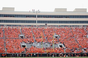 STILLWATER, OK - SEPTEMBER 05:  Fans of the Oklahoma State Cowboys fill the west endzone seats during the college football game against the Georgia Bulldogs at Boone Pickens Stadium on September 5, 2009 in Stillwater, Oklahoma.  The Cowboys defeated the B