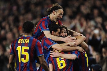 BARCELONA, SPAIN - APRIL 06:  Players of Barcelona celebrate their fourth goal scored by Lionel Messi during the UEFA Champions League quarter final second leg match between Barcelona and Arsenal at Camp Nou on April 6, 2010 in Barcelona, Spain.  (Photo b