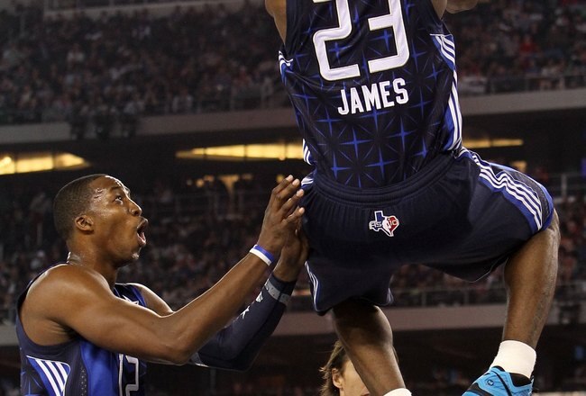 ARLINGTON, TX - FEBRUARY 14: Dwight Howard #12 of the Eastern Conference reacts as LeBron James #23 dunks against the Western Conference during the second half of the NBA All-Star Game, part of 2010 NBA All-Star Weekend at Cowboys Stadium on February 14,
