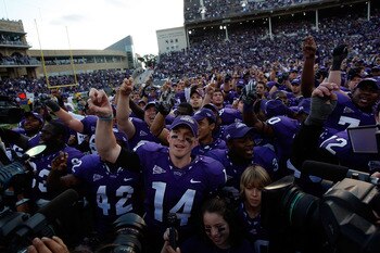 FORT WORTH, TX - NOVEMBER 28:  Quarterback Andy Dalton #14 of the TCU Horned Frogs celebrates a win against the New Mexico Lobos at Amon G. Carter Stadium on November 28, 2009 in Fort Worth, Texas.  (Photo by Ronald Martinez/Getty Images)