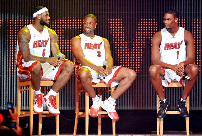MIAMI - JULY 09:   LeBron James #6, Dwyane Wade #3 and Chris Bosh #1 of the Miami Heat speak after being introduced to fans during a welcome party at American Airlines Arena on July 9, 2010 in Miami, Florida.  (Photo by Doug Benc/Getty Images)