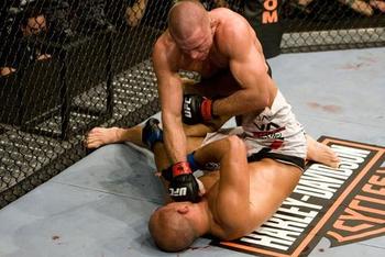 georges-st-pierre-punches-bj-penn-at-ufc-94_display_image.jpg?1282781967