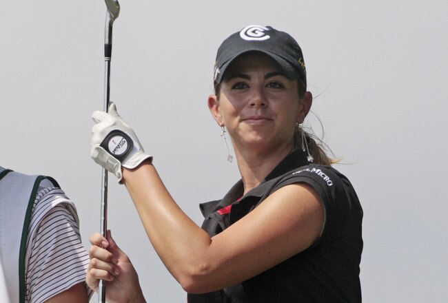 MOBILE, AL - SEPTEMBER 12:  Erica Blasberg pulls a club from her bag on the 7th fairway during second round play in the Bell Micro LPGA Classic at Magnolia Grove Golf Course on September 12, 2008 in Mobile, Alabama.  (Photo by Dave Martin/Getty Images)