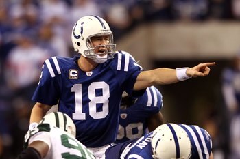 INDIANAPOLIS - JANUARY 24:  Quarterback Peyton Manning #18 of the Indianapolis Colts under center during the second half against the New York Jets during the AFC Championship Game at Lucas Oil Stadium on January 24, 2010 in Indianapolis, Indiana. The Colt