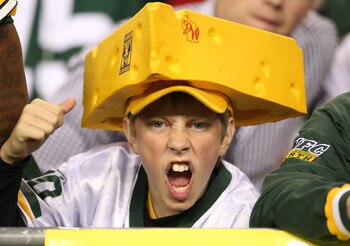 SEATTLE - AUGUST 21:  A fan of the Green Bay Packers cheers during the preseason game against the Seattle Seahawks at Qwest Field on August 21, 2010 in Seattle, Washington. (Photo by Otto Greule Jr/Getty Images)