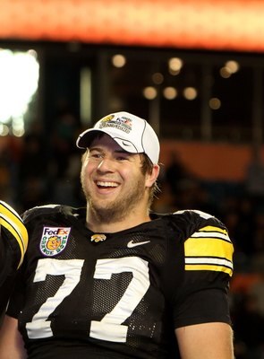 MIAMI GARDENS, FL - JANUARY 05:  (L-R) Trey Stross #86 and Riley Reiff #77 of the Iowa Hawkeyes celebrate after Iowa won 24-14  against the Georgia Tech Yellow Jackets during the FedEx Orange Bowl at Land Shark Stadium on January 5, 2010 in Miami Gardens,