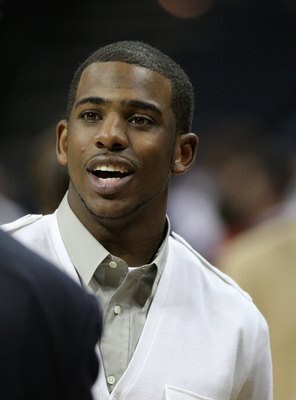 CHARLOTTE - APRIL 24:  New Orleans Hornets guard and former Wake Forest star Chris Paul talks on the court after Game Three of the Eastern Conference Quarterfinals between the Orlando Magic and the Charlotte Bobcats during the 2010 NBA Playoffs at Time Wa