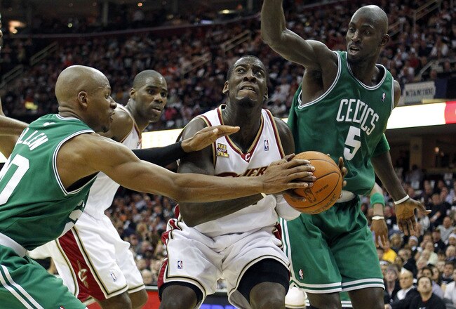 CLEVELAND - MAY 03:  J.J. Hickson #21 of the Cleveland Cavaliers tries to get around the defense of Ray Allen #20 and Kevin Garnett #5 of the Boston Celtics in Game Two of the Eastern Conference Semifinals during the 2010 NBA Playoffs at Quicken Loans Are