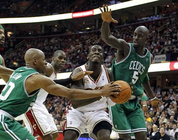 CLEVELAND - MAY 03:  J.J. Hickson #21 of the Cleveland Cavaliers tries to get around the defense of Ray Allen #20 and Kevin Garnett #5 of the Boston Celtics in Game Two of the Eastern Conference Semifinals during the 2010 NBA Playoffs at Quicken Loans Are